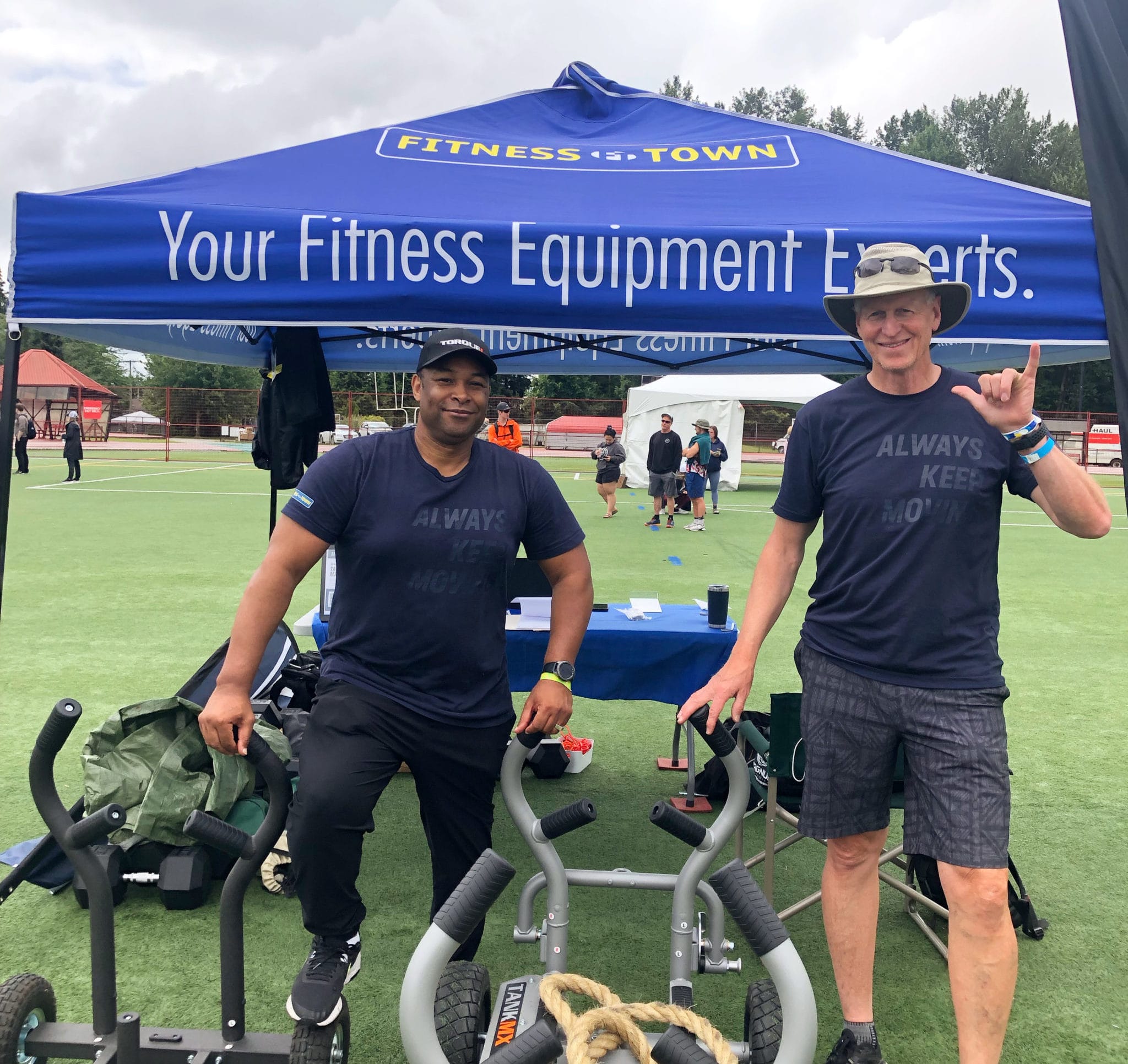 James Newman &amp; Arlen Quashi at the Canwest Games demoing the Torque Tank fitness sled